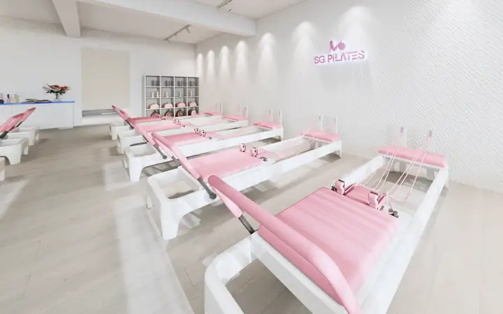Baby-pink reformers at SG Pilates Tampines East