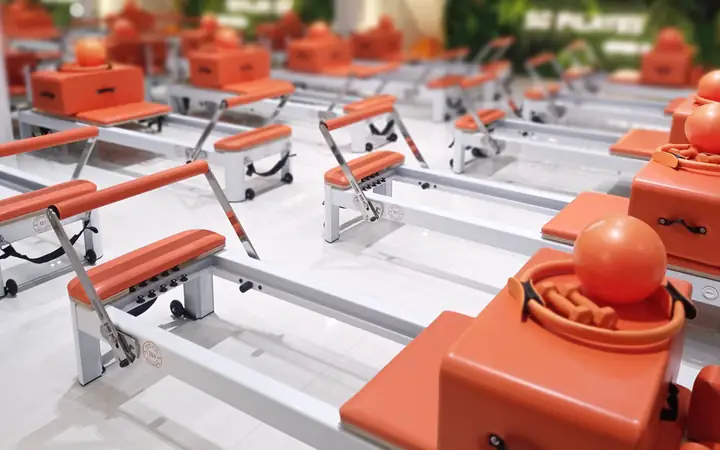Orange reformers at SG Pilates Upper Thomson
