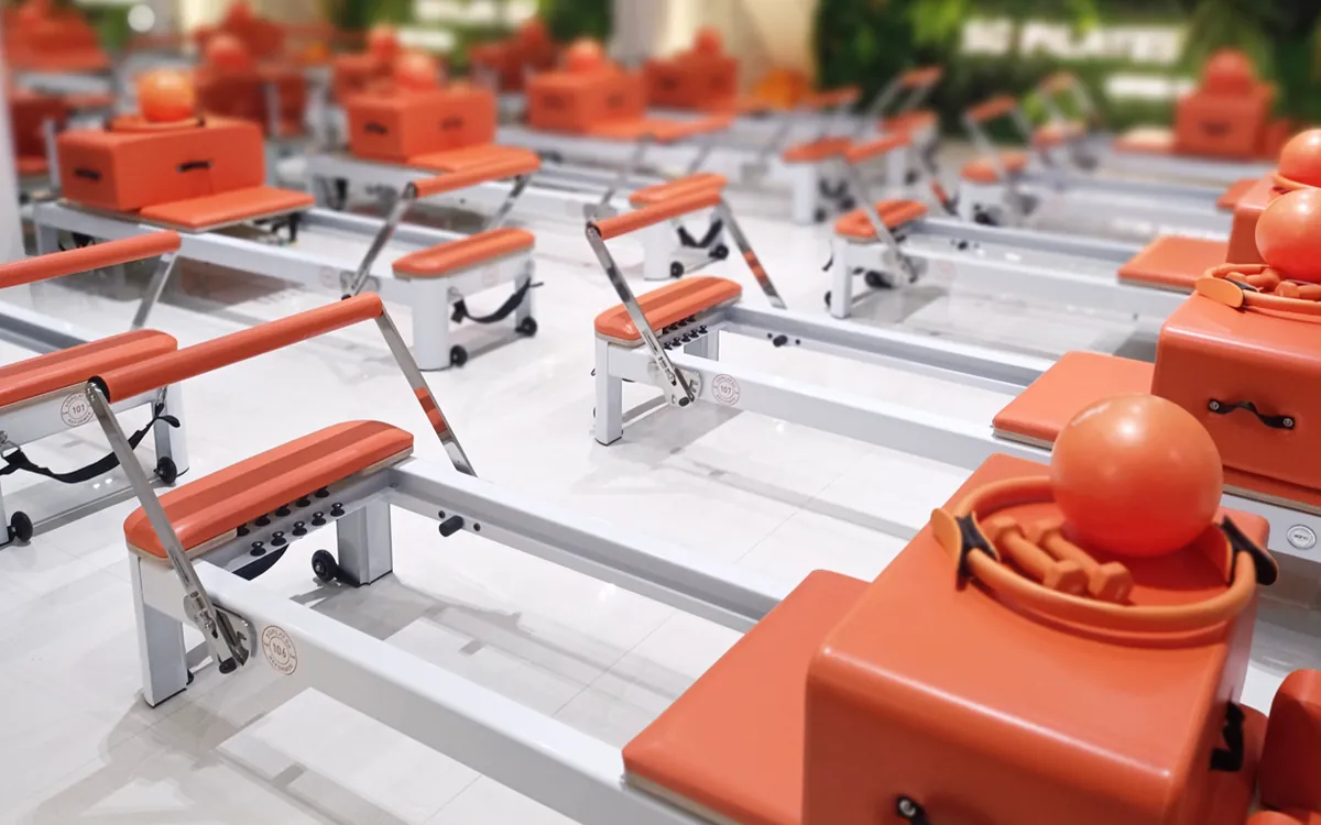 Orange reformers at SG Pilates Upper Thomson